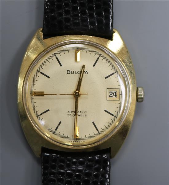 A gentlemans 9ct gold Bulova automatic wrist watch. A gentlemans 9ct gold Bulova automatic wrist watch.