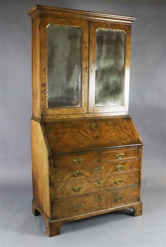An early 18th century walnut bureau bookcase, W.3ft 6in. D.1ft 10in. H.6ft 10in. An early 18th century walnut bureau bookcase, W.3ft 6in. D.1ft 10in. H.6ft 10in.