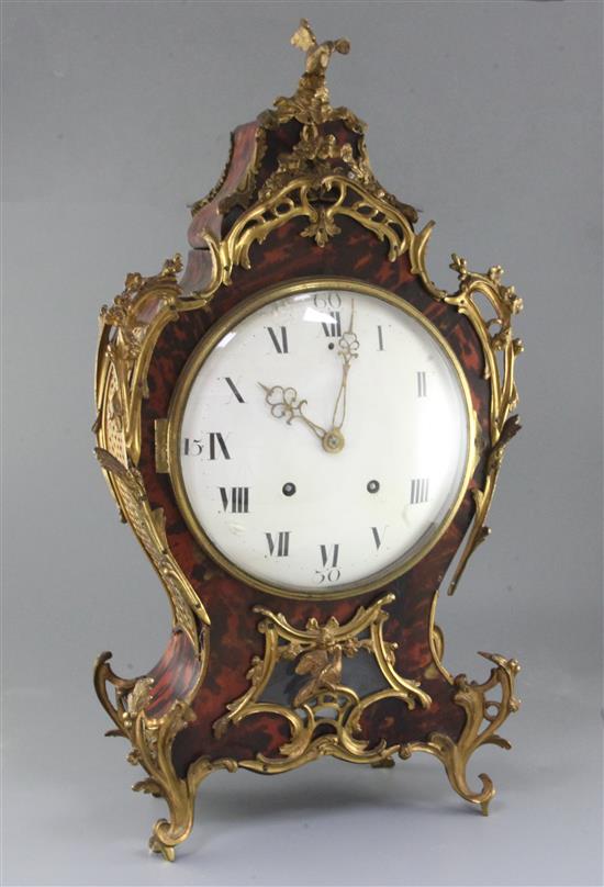 A 19th century French Louis XVI style ormolu mounted red tortoiseshell bracket clock, height 26in. bracket 13in. A 19th century French Louis XVI style ormolu mounted red tortoiseshell bracket clock, height 26in. bracket 13in.