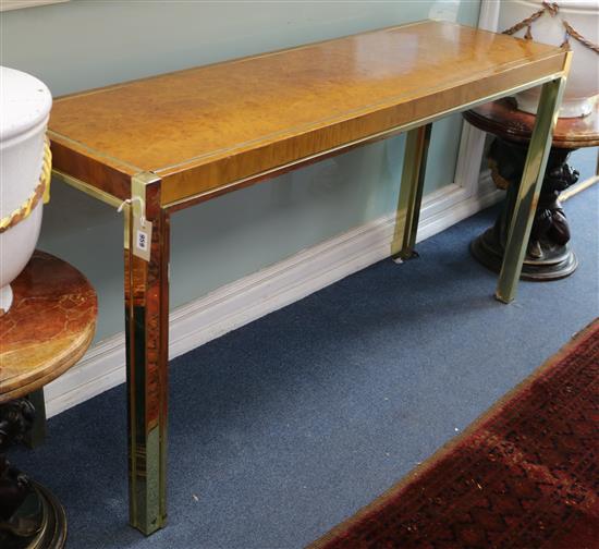 A burr walnut console table W.151cm A burr walnut console table W.151cm