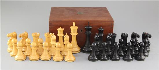 A Jaques & Son Staunton boxwood and ebony chess set, kings 4.25in., board 22 x 21.75in. A Jaques & Son Staunton boxwood and ebony chess set, kings 4.25in., board 22 x 21.75in.