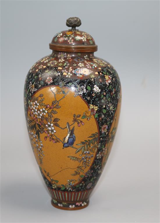 A Japanese silver wine cloisonne enamel vase, Meiji period, manner of Honda Yosaburo A Japanese silver wine cloisonne enamel vase, Meiji period, manner of Honda Yosaburo