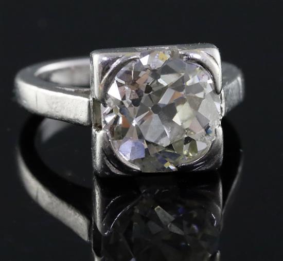 A 1940s? platinum and solitaire diamond ring, the old round cut stone weighing approximately 3.30cts,