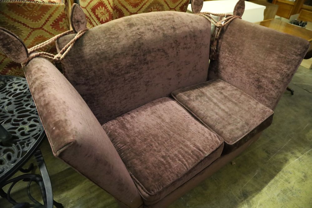 A Knole settee upholstered in mauve fabric, 170 x 80cm, height 92cm
