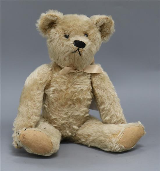 An American teddy bear, Jenny, c.1912, with pale blond mohair, black ...