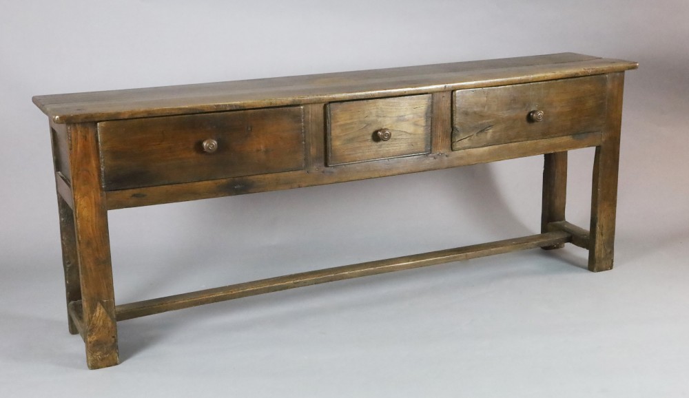 A late 18th century style oak dresser base, W.6ft 7in. D.1ft 4in. H.2ft 6in. A late 18th century style oak dresser base, W.6ft 7in. D.1ft 4in. H.2ft 6in.