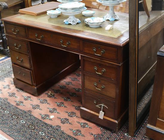 An Edwardian mahogany pedestal desk W.122cm An Edwardian mahogany pedestal desk W.122cm