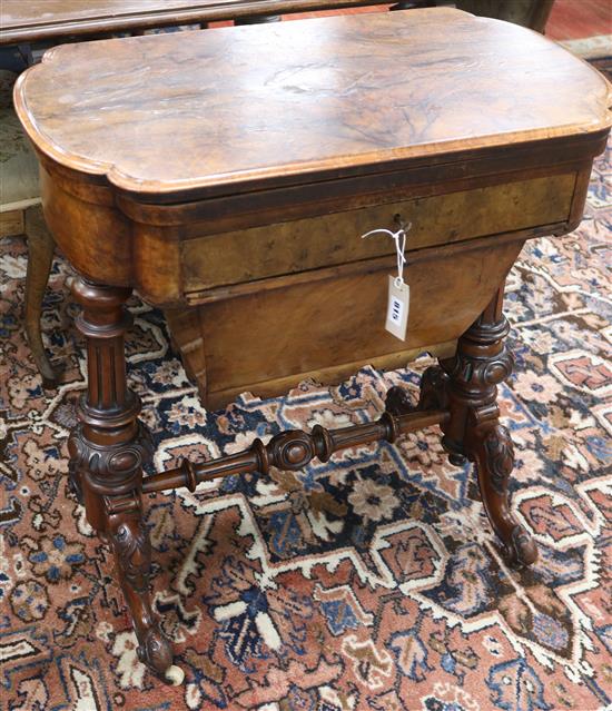 A Victorian walnut games / work table W.71.5cm A Victorian walnut games / work table W.71.5cm