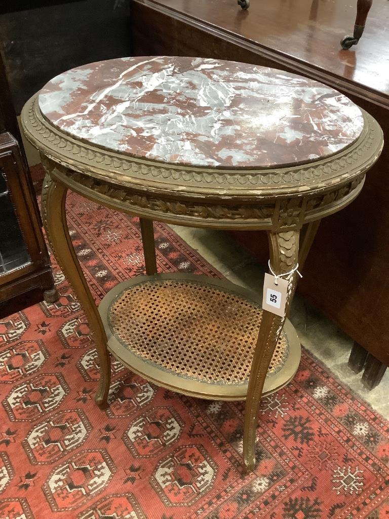 A French gilt marble topped oval table, width 56cm depth 43cm height 75cm