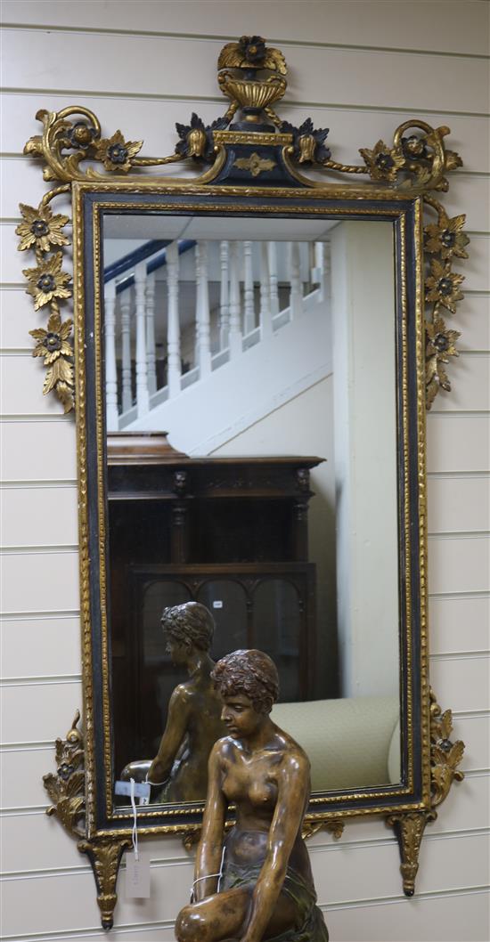 A Swedish parcel gilt painted wood hall mirror W.70cm approx. A Swedish parcel gilt painted wood hall mirror W.70cm approx.