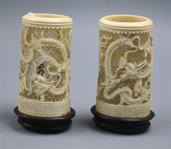 A pair of Chinese ivory dragon vases, late 19th century A pair of Chinese ivory dragon vases, late 19th century