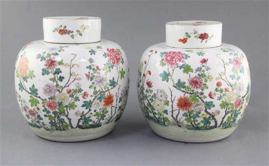 A pair of Chinese famille rose globular jars and covers, late 19th century, height 21.5cm, slight firing faults A pair of Chinese famille rose globular jars and covers, late 19th century, height 21.5cm, slight firing faults