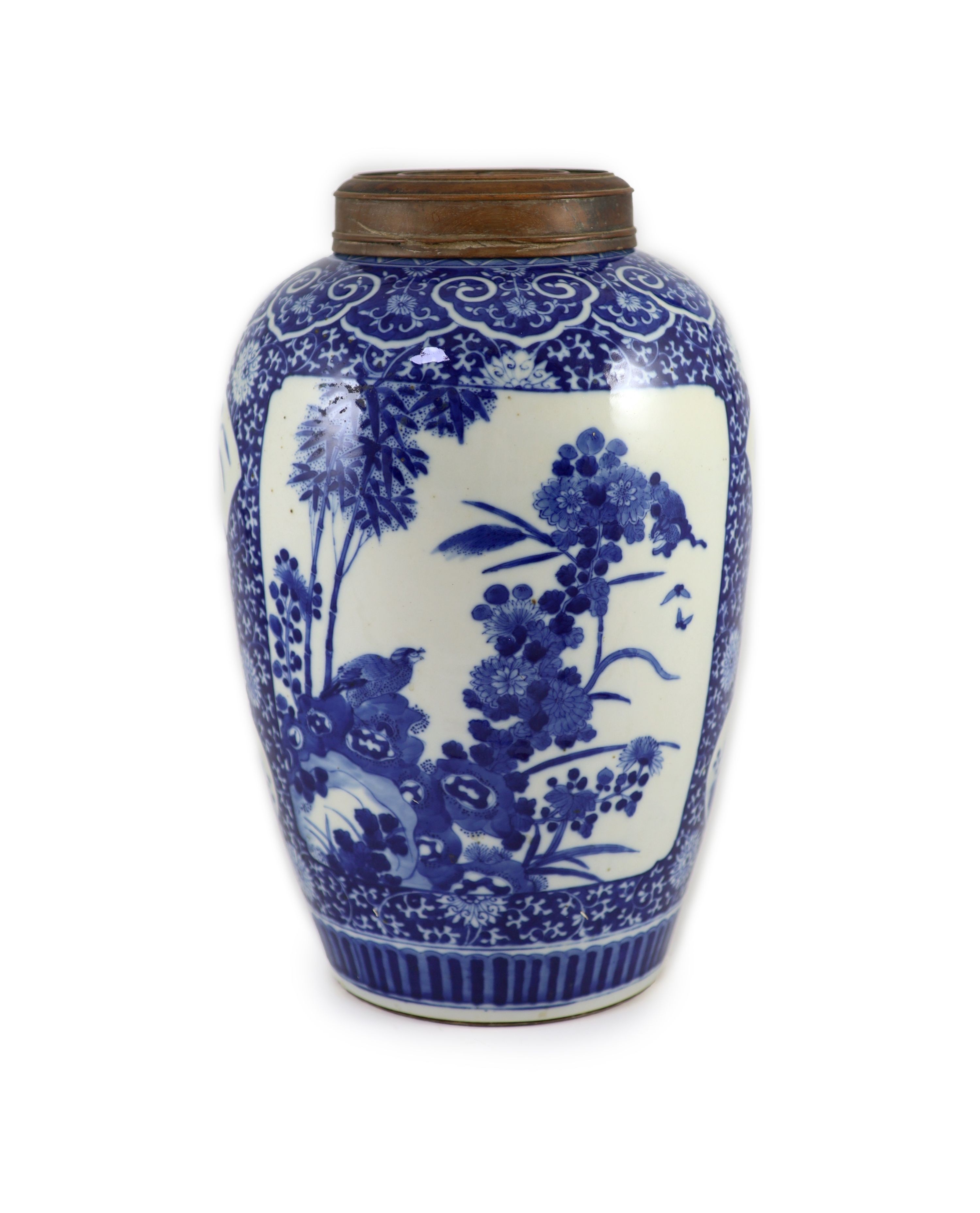 A large Chinese blue and white ovoid jar, 19th century, 35cm high, wood cover