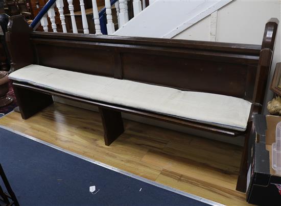 An oak pew W.216cm An oak pew W.216cm