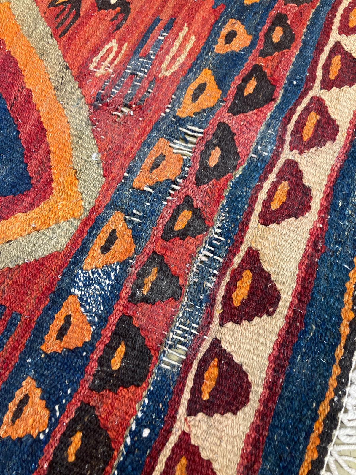 A polychrome Kelim rug, 270 x 134cm.