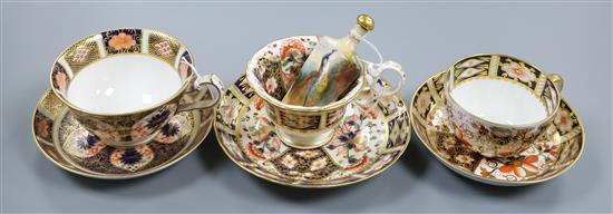 A Royal Worcester scent flask and three Royal Crown Derby Imari duos, H 10cm (flask)
