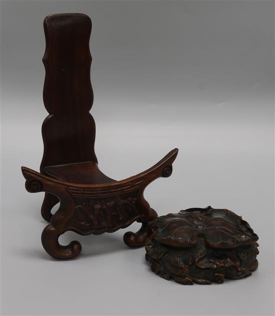 A zitan carved lotus leaf and a carved wood stand tallest 28cm A zitan carved lotus leaf and a carved wood stand tallest 28cm