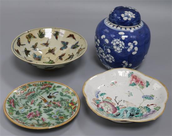 A Chinese straight butterfly bowl, a Straits footed bowl with rabbit, a prunus ginger jar and a Canton dish A Chinese straight butterfly bowl, a Straits footed bowl with rabbit, a prunus ginger jar and a Canton dish
