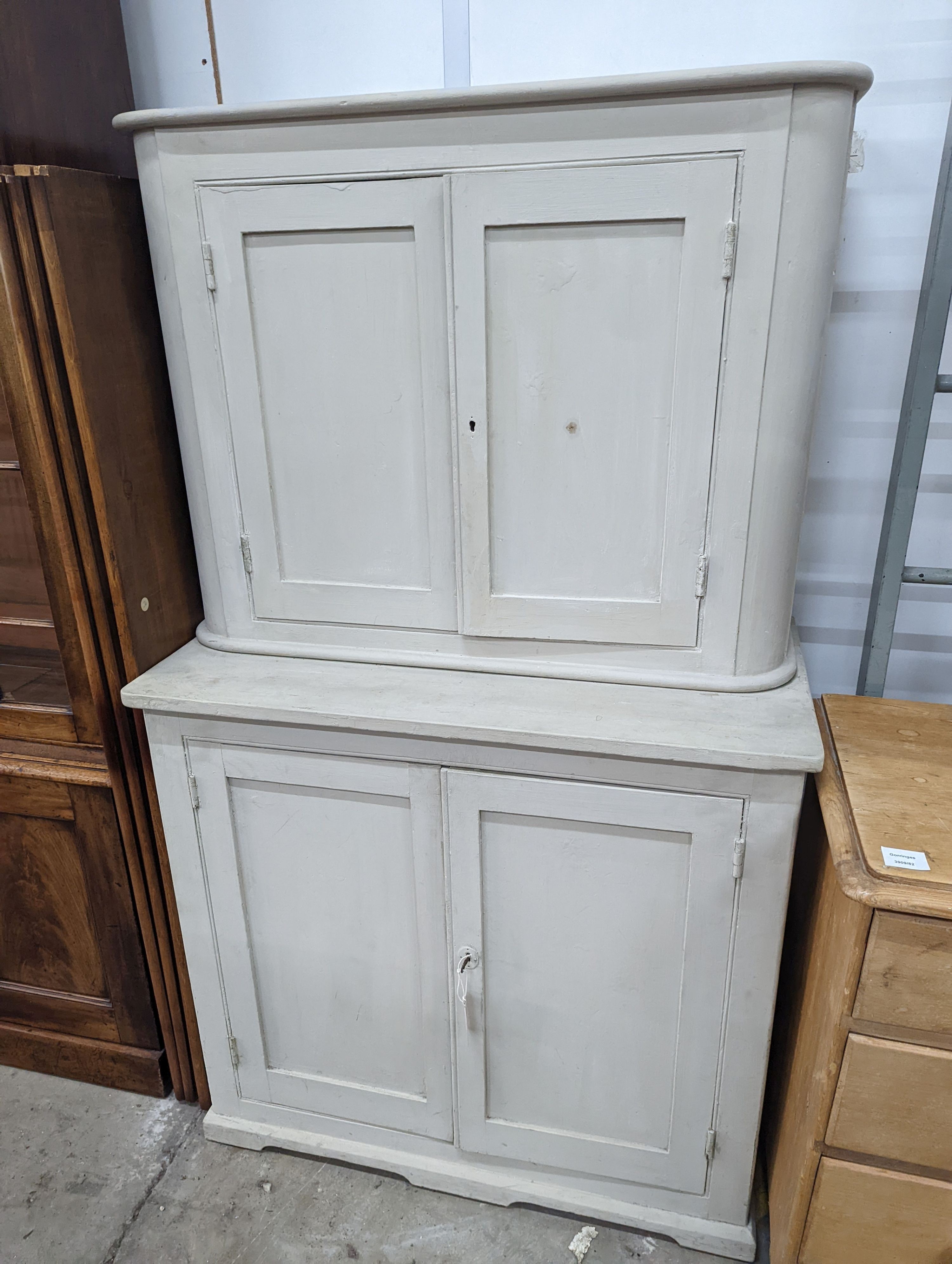 A 19th century Continental painted pine side cabinet, width 91cm, depth 47cm, height 154cm