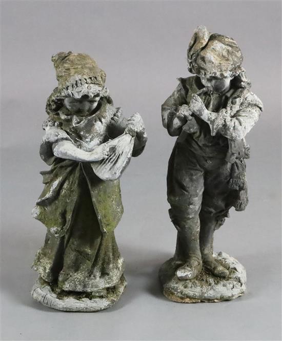 A pair of lead garden statues, H.1ft 10.5in. A pair of lead garden statues, H.1ft 10.5in.