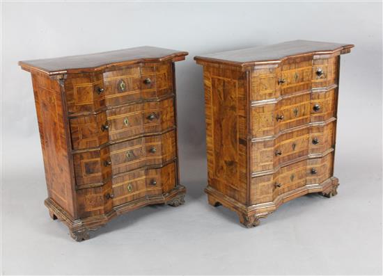 A pair of 18th century Italian walnut commodes, W.2ft 4in. D.1ft 4in. H.2ft 9in. A pair of 18th century Italian walnut commodes, W.2ft 4in. D.1ft 4in. H.2ft 9in.