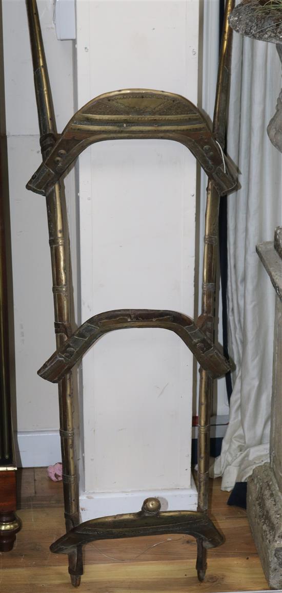 A Middle Eastern metal horse saddle A Middle Eastern metal horse saddle
