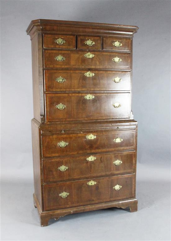 A George II walnut chest on chest, W.3ft 5in. D.1ft 10in. H.6ft 5in. A George II walnut chest on chest, W.3ft 5in. D.1ft 10in. H.6ft 5in.