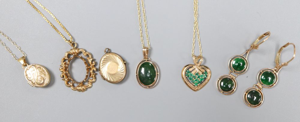 A 9ct gold and emerald heart pendant on chain, a 750 chain with scrolled pendant (vacant) and sundry items,