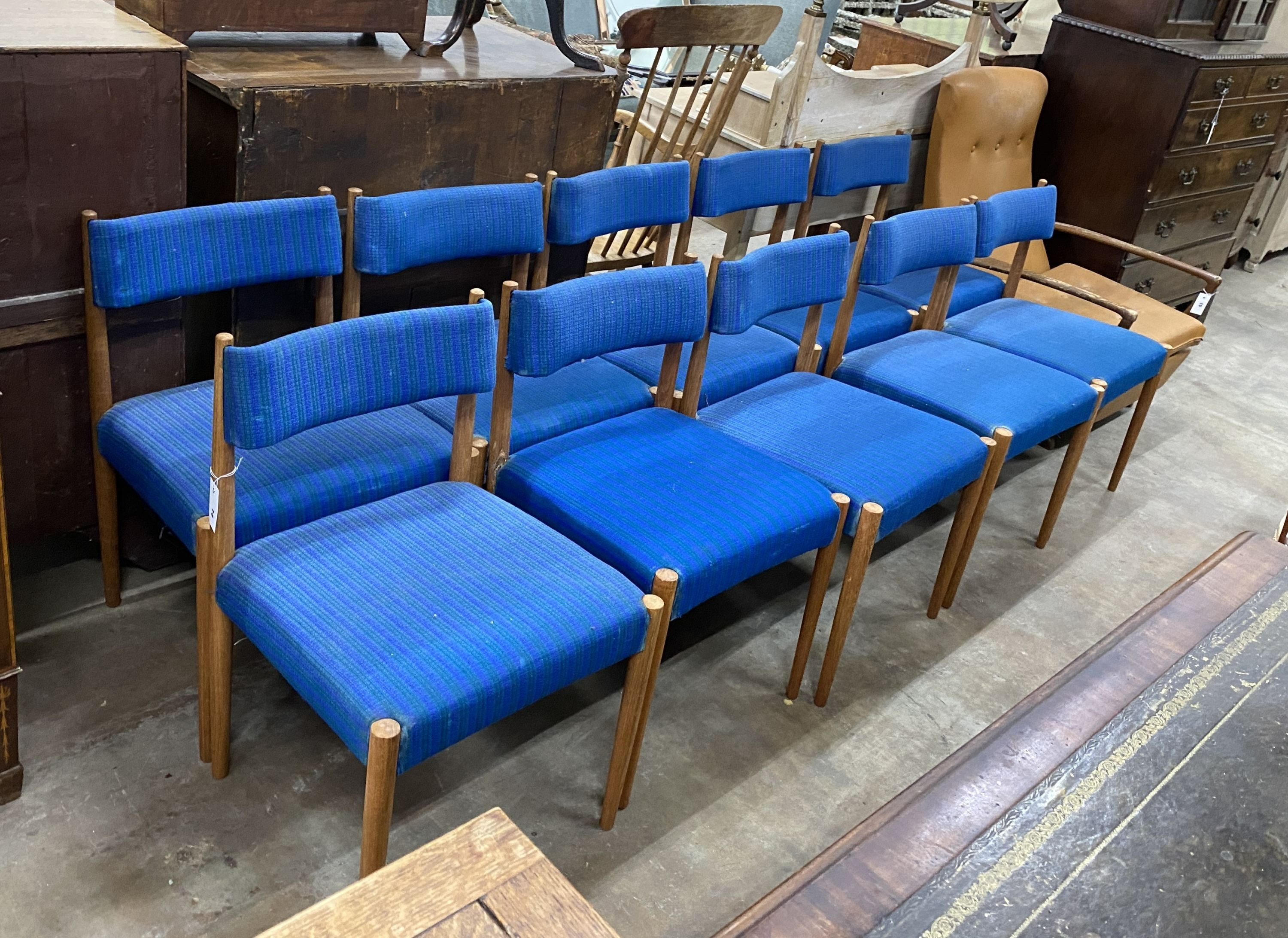 A set of ten Archie Shine by Robert Heritage teak ribbon back dining chairs