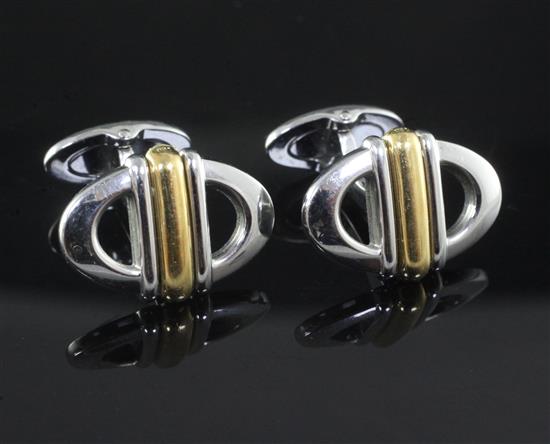 A pair of Dunhill James Bond, Tomorrow Never Dies (1997) 18ct gold overlaid steel cufflinks in original case. A pair of Dunhill James Bond, Tomorrow Never Dies (1997) 18ct gold overlaid steel cufflinks in original case.