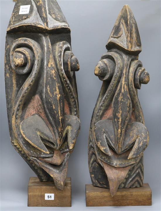 Two New Ireland? pigmented wooden masks height 81cm