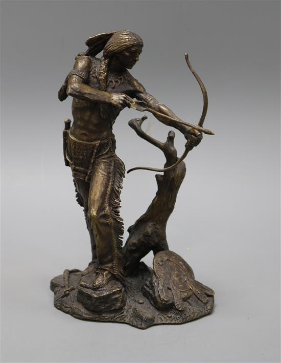A bronze figure of a Native American archer height 24cm