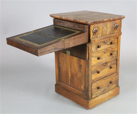 A William IV rosewood davenport, W.1ft 10in. D.1ft 8in. H.2ft 10in. A William IV rosewood davenport, W.1ft 10in. D.1ft 8in. H.2ft 10in.