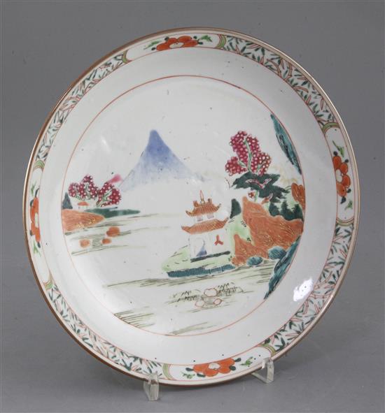 A Chinese famille rose landscape saucer dish, early Qianlong period, diameter 22cm A Chinese famille rose landscape saucer dish, early Qianlong period, diameter 22cm