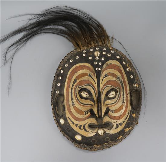A cowrie inset Sepik River ancestory mask length 29.5cm