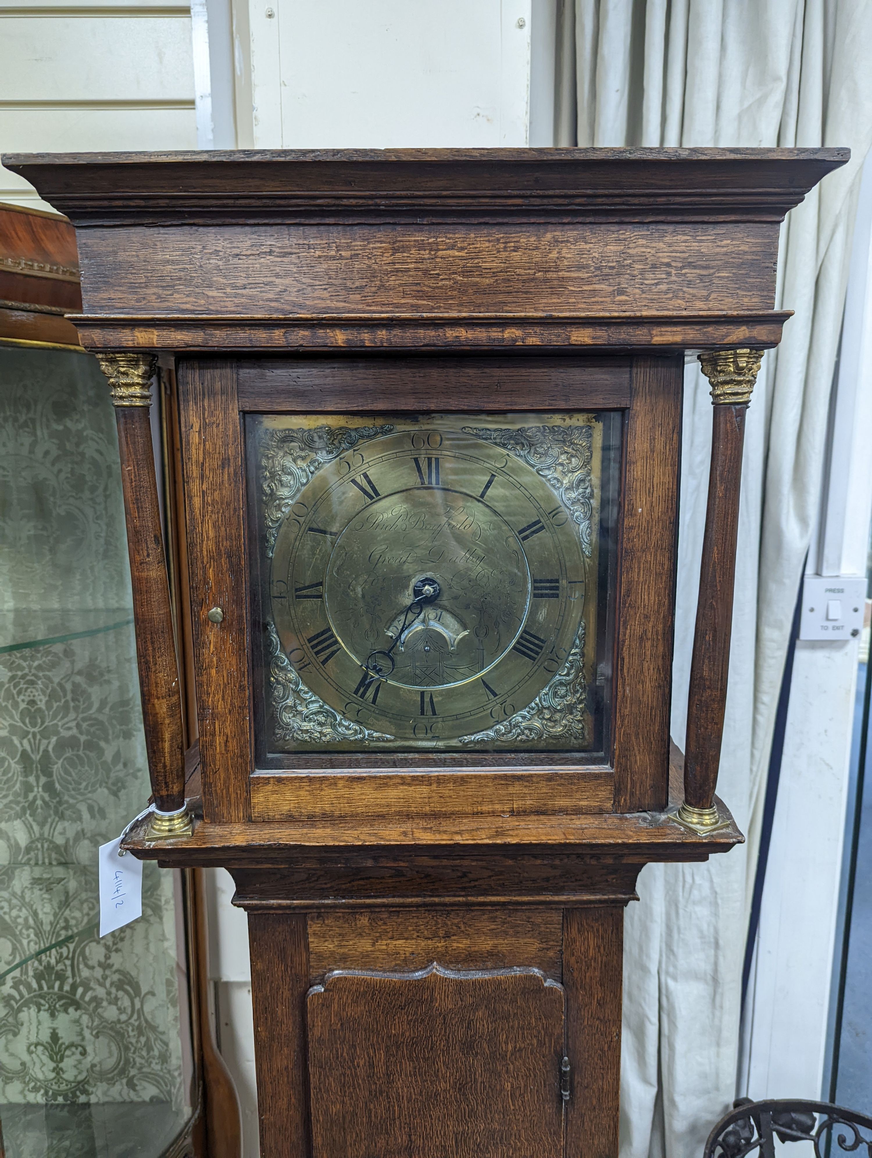An 18th century oak 30 hour longcase clock with brass dial marked Richard Boyfield, Great Dalby, height 181cm