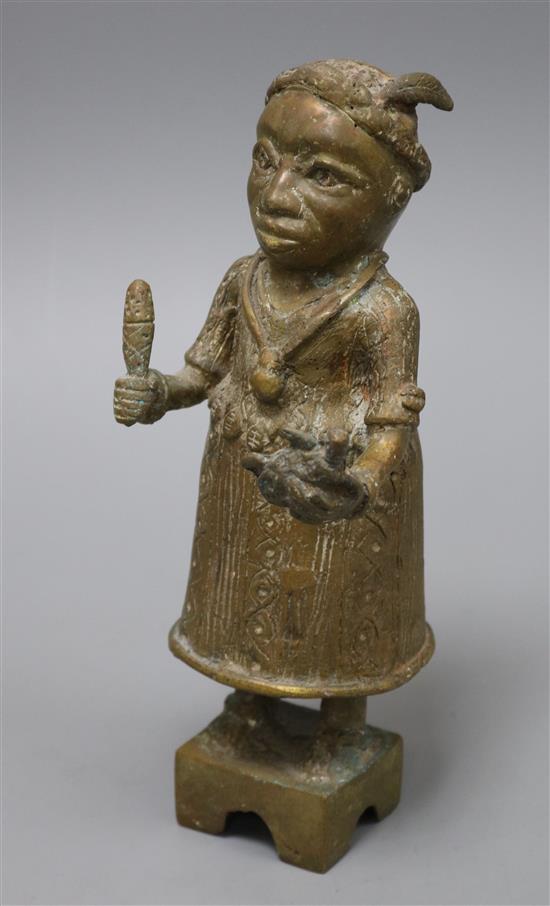 A Benin bronze figure of a girl with turtle height 23cm