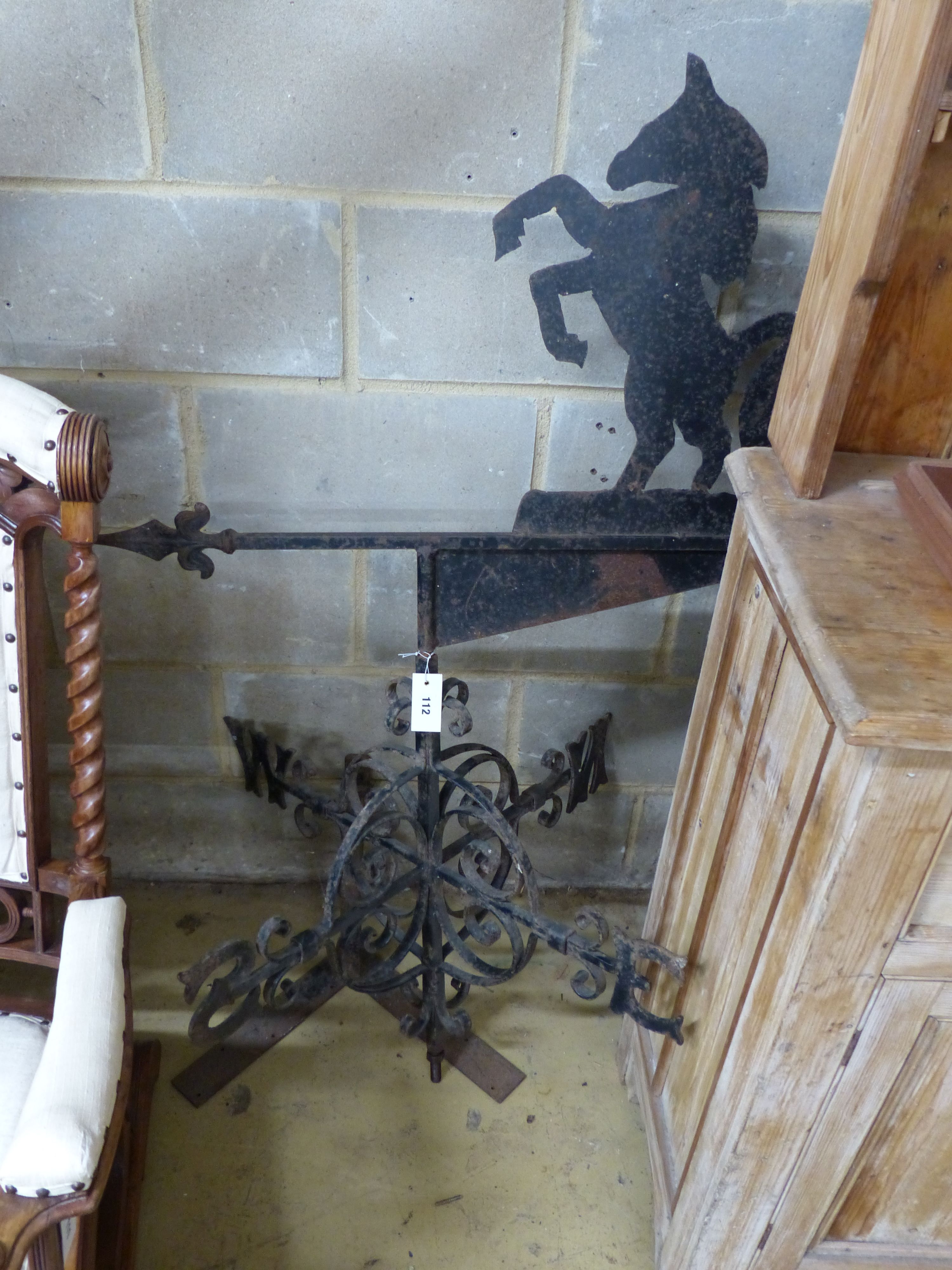 A wrought iron weather vane with rampant horse finial, height 137cm