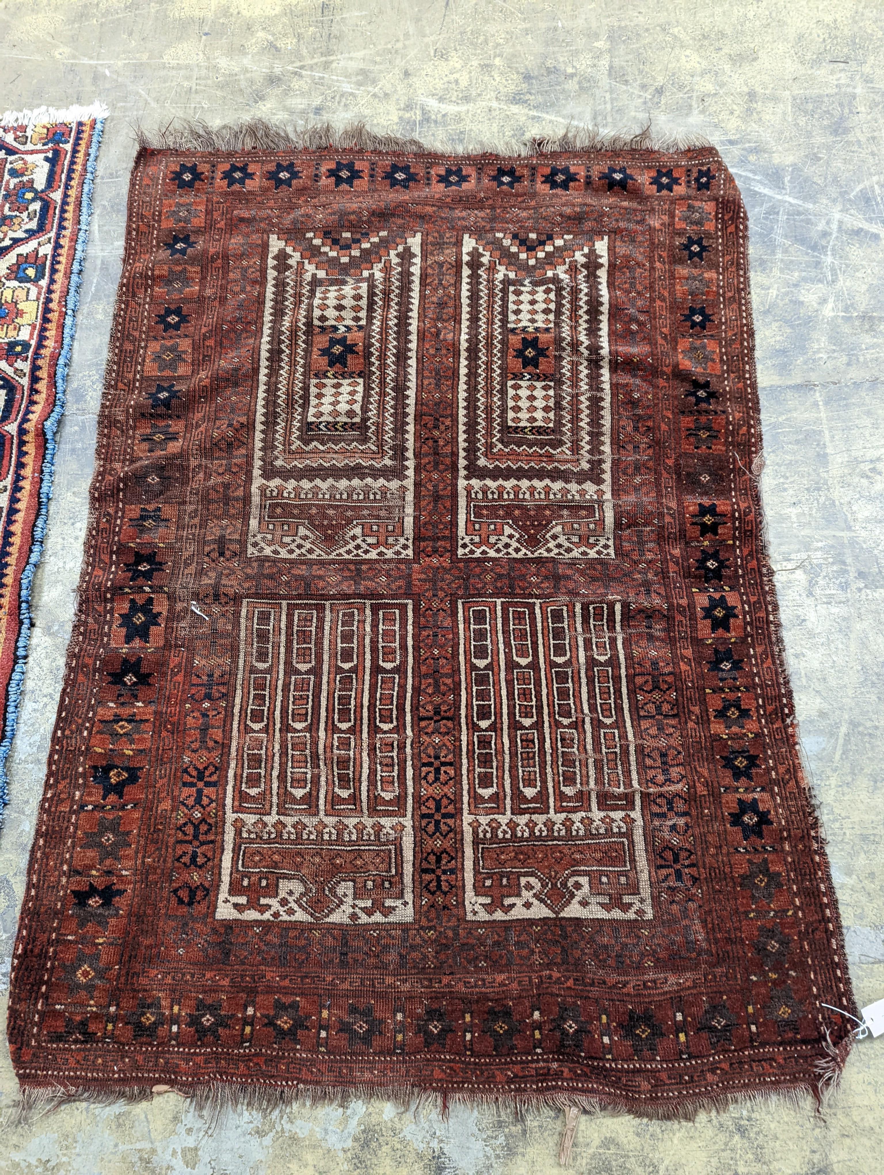 An Afghan red ground prayer rug, 166 x 120cm