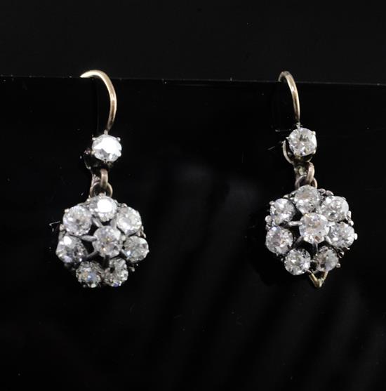 A pair of antique gold and diamond cluster drop earrings, 14mm. A pair of antique gold and diamond cluster drop earrings, 14mm.