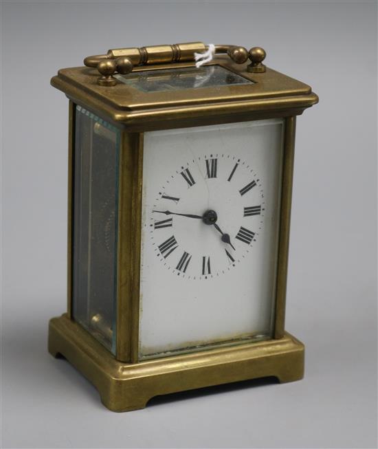 A gilt-brass carriage timepiece (a.f.) A gilt-brass carriage timepiece (a.f.)