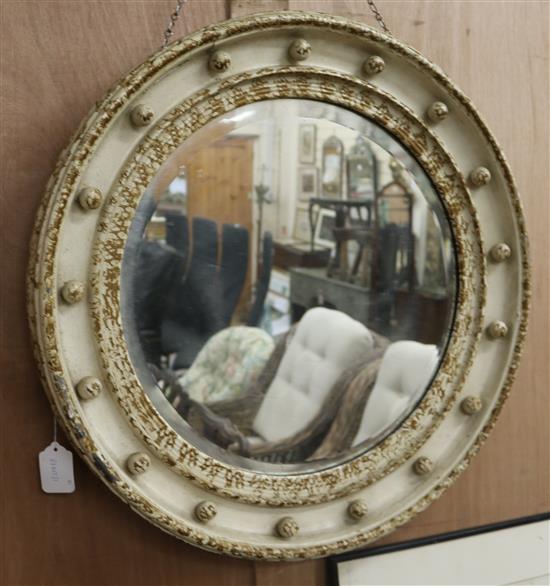 A painted circular wall mirror and a pub mirror circular W.62cm pub W.51cm A painted circular wall mirror and a pub mirror circular W.62cm pub W.51cm
