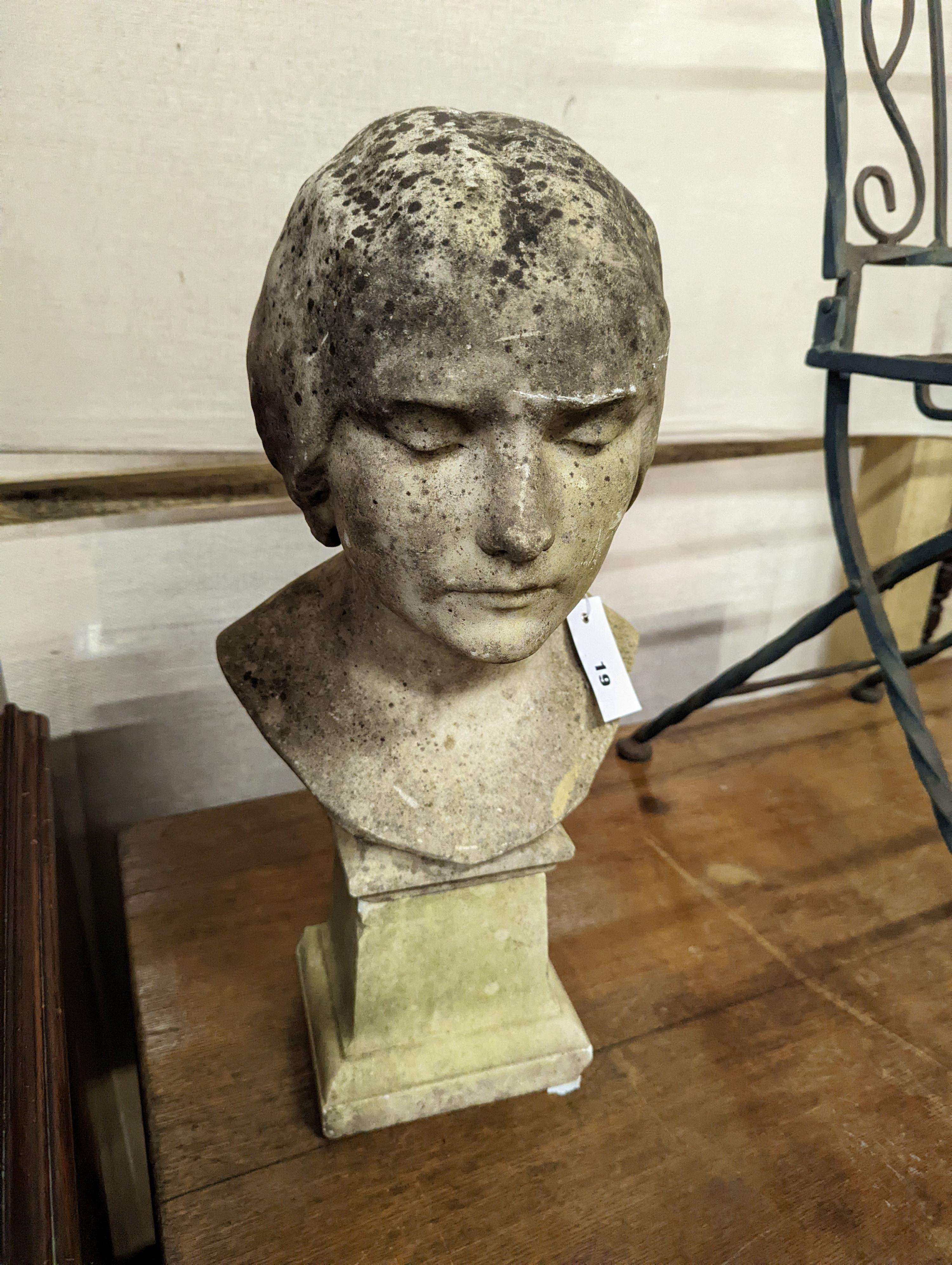 A late 19th / early 20th century carved marble bust of a girl (possibly L'Inconnue de la Seine), height 53cm