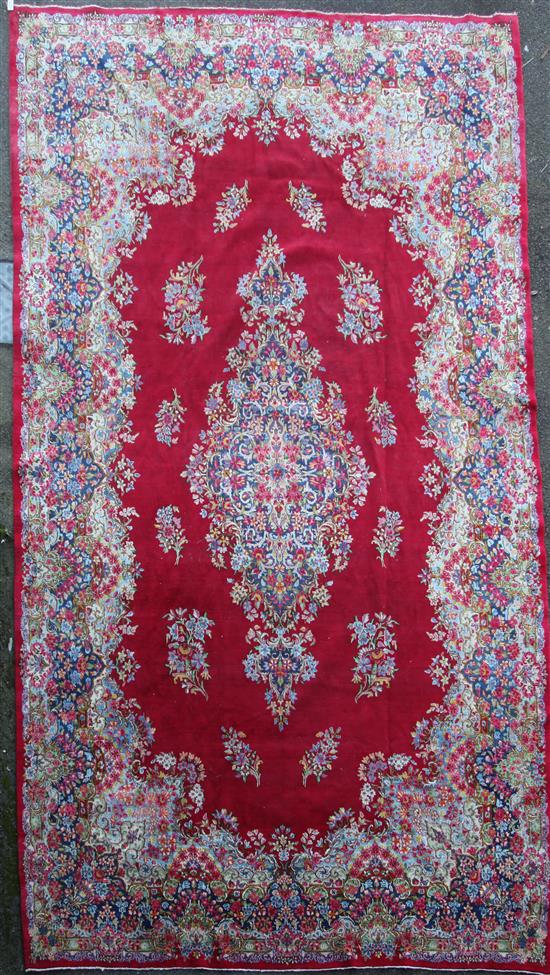 A North West Persian red ground carpet, A North West Persian red ground carpet,