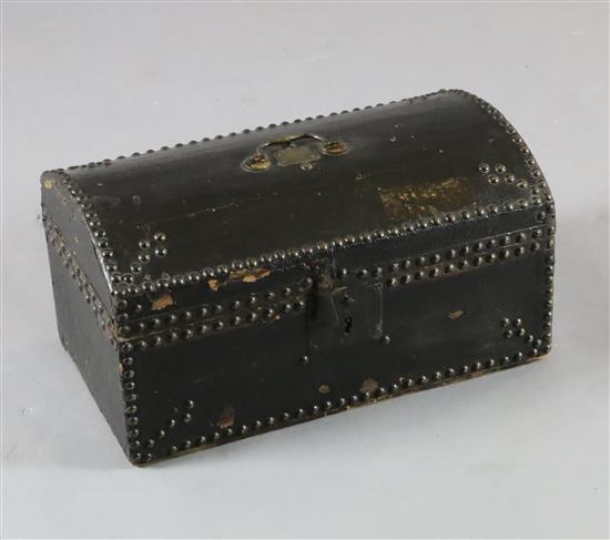 An 18th century small domed topped leather trunk, W.17.5in. D.10in. H.9in. An 18th century small domed topped leather trunk, W.17.5in. D.10in. H.9in.