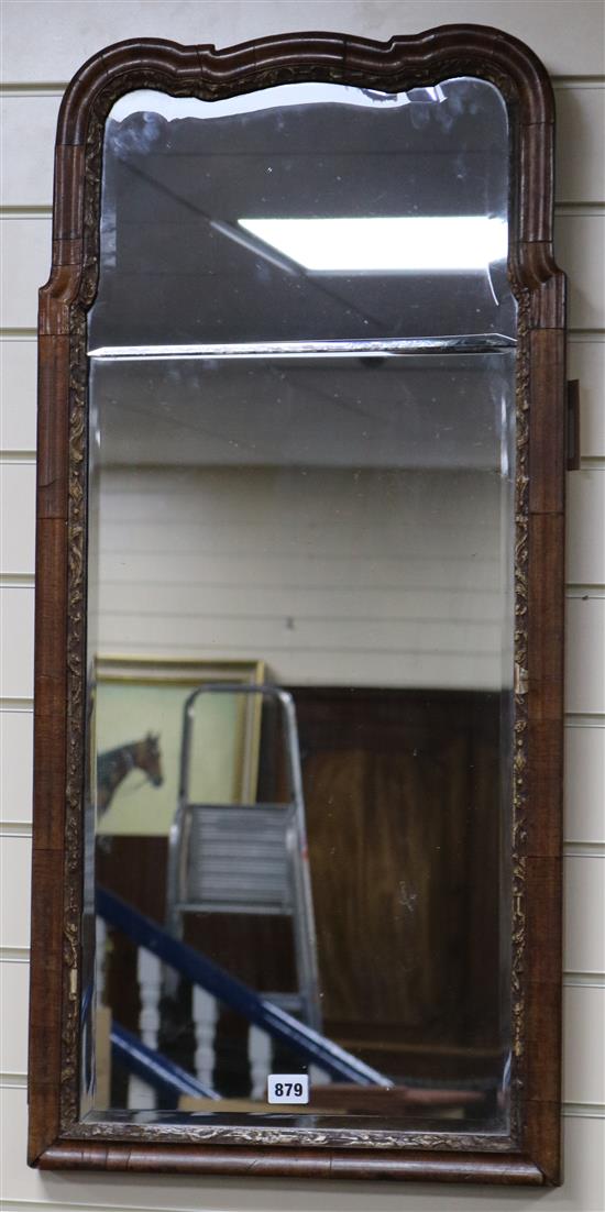 A Queen Anne walnut and parcel-gilt wall mirror W.42cm A Queen Anne walnut and parcel-gilt wall mirror W.42cm