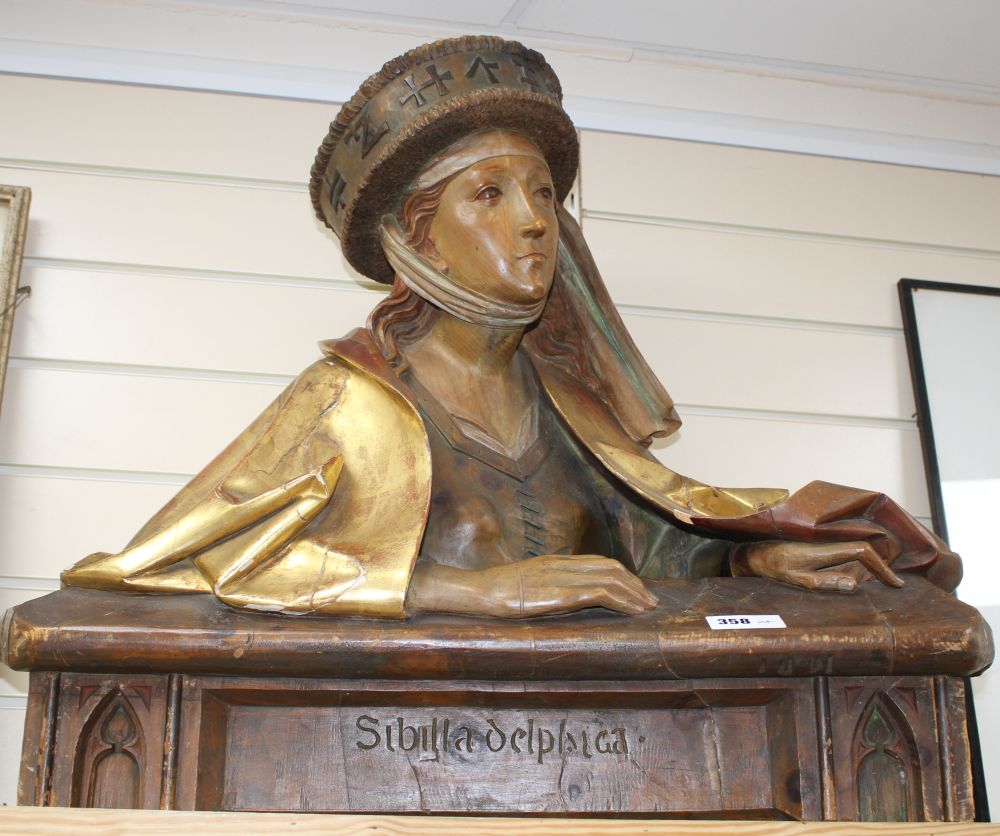 A late 19th century Black Forest carved gilt and stained pine bust of Sibilla Delphica, height 62cm width 70cm