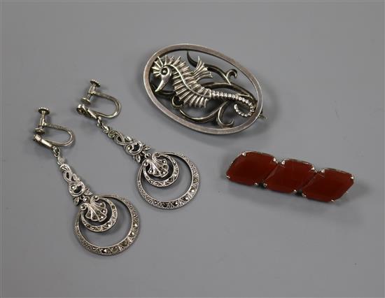 An Ivan Tarratt designed by Geoffrey G. Bellamy silver oval Seahorse brooch, a pair of marcasite drop earrings and one other brooch An Ivan Tarratt designed by Geoffrey G. Bellamy silver oval Seahorse brooch, a pair of marcasite drop earrings and one other brooch