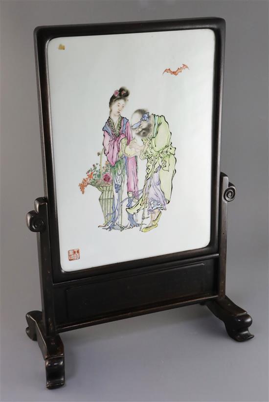 A Chinese famille rose and hongmu table screen, early 20th century, Total dimensions 60.5cm x 41cm A Chinese famille rose and hongmu table screen, early 20th century, Total dimensions 60.5cm x 41cm