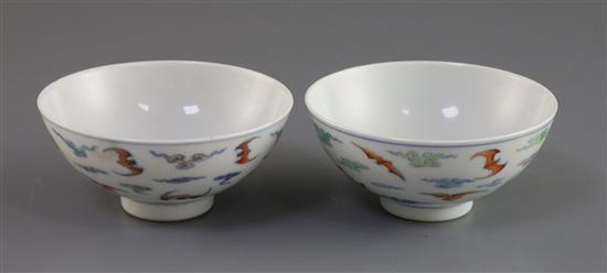 A pair of Chinese doucai bat bowls, Yongzheng mark, Republic period, D. 9.7cm, one bowl restored A pair of Chinese doucai bat bowls, Yongzheng mark, Republic period, D. 9.7cm, one bowl restored